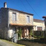 Charmante grange en pierre apparente avec maison d'habitation à Chazelles