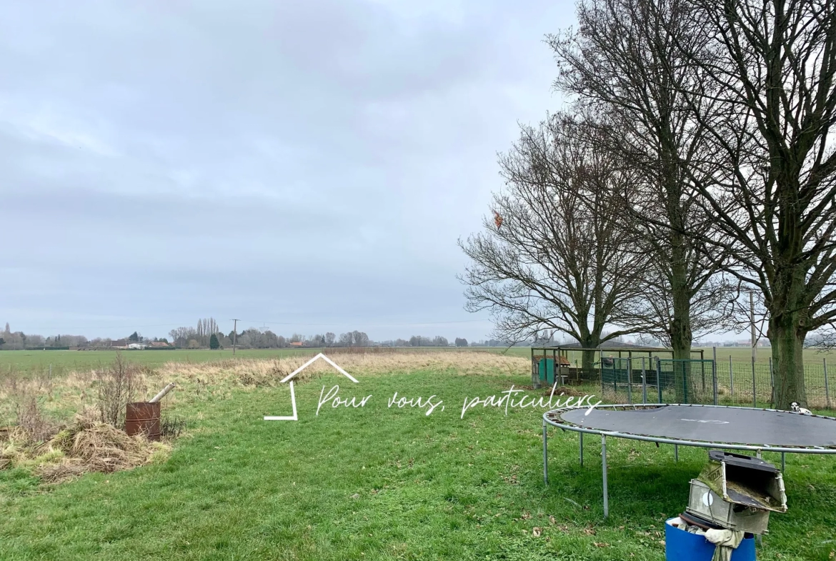 Corps de ferme individuel avec 4 chambres, jardin et garage à Sailly sur la lys 