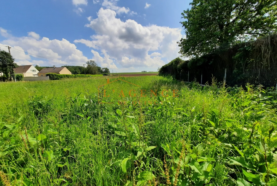 Terrain à bâtir de 420m2 à Bouleurs 