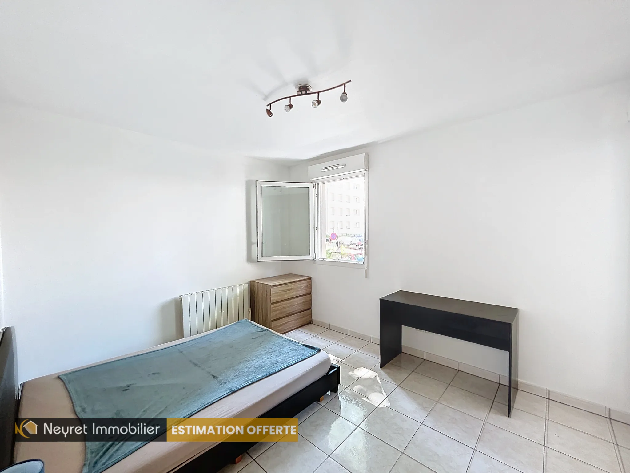 Appartement T3 avec balcon et jardin privatif à Venissieux 