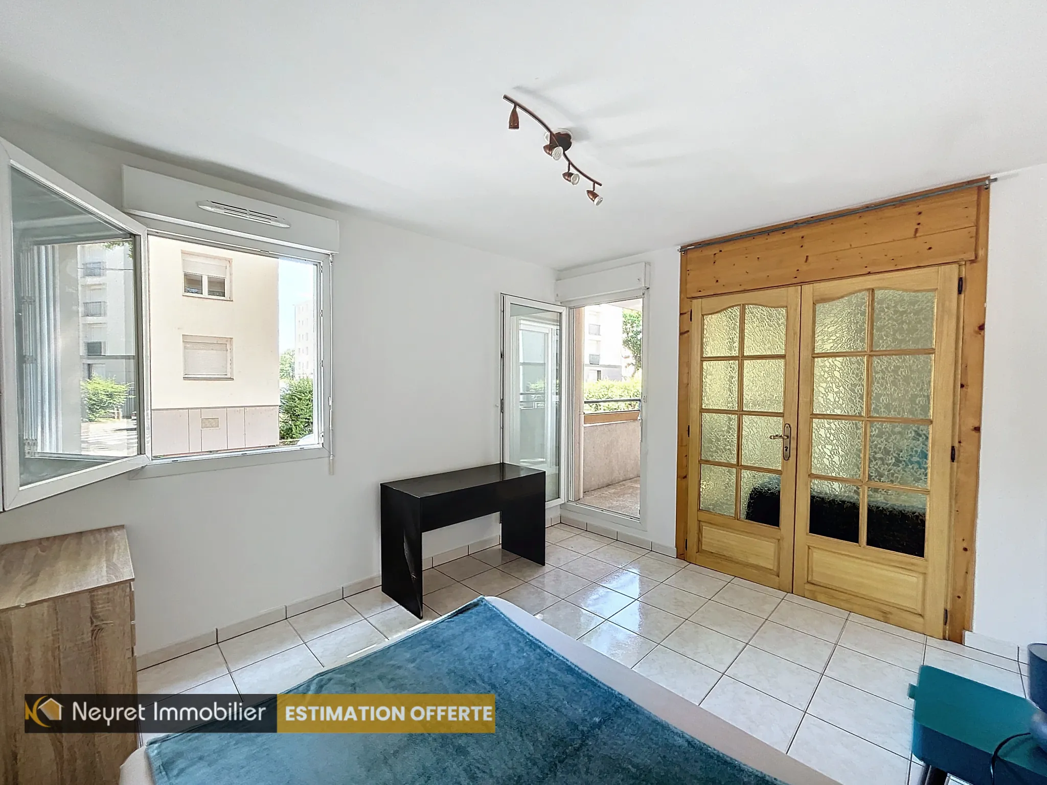 Appartement T3 avec balcon et jardin privatif à Venissieux 