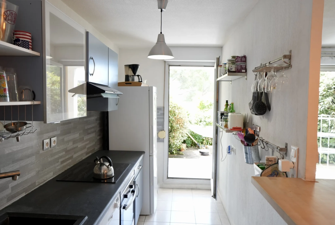 Appartement T3 en rez-de-jardin avec belle terrasse arborée à Alco 