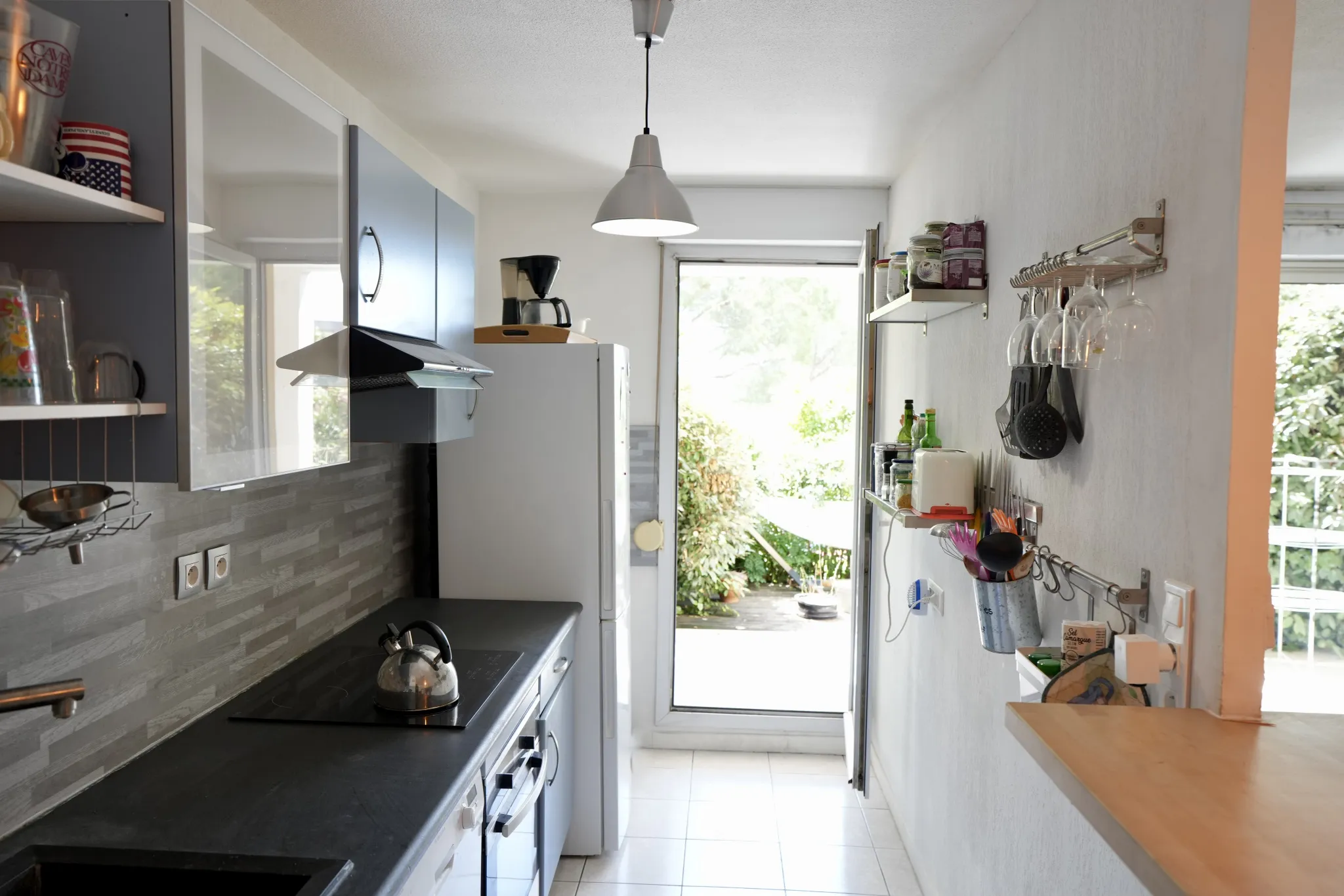 Appartement T3 en rez-de-jardin avec belle terrasse arborée à Alco 