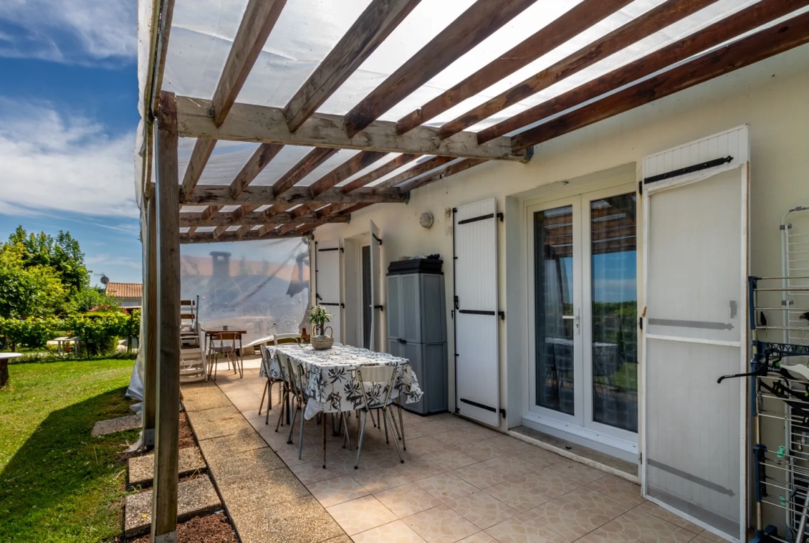 Maison 3 chambres, un T2 indépendant, beau jardin, carport à St-Georges-des-Coteaux 