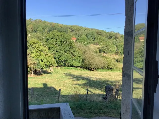 Maison en pierre avec vue à Sainte Colombe 