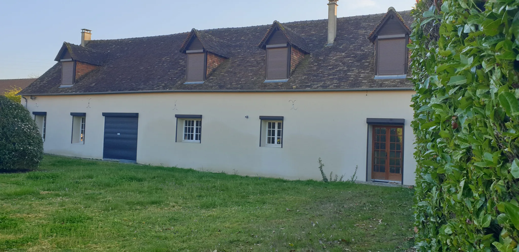 Maison de plain-pied avec 2 chambres et jardin clôturé 