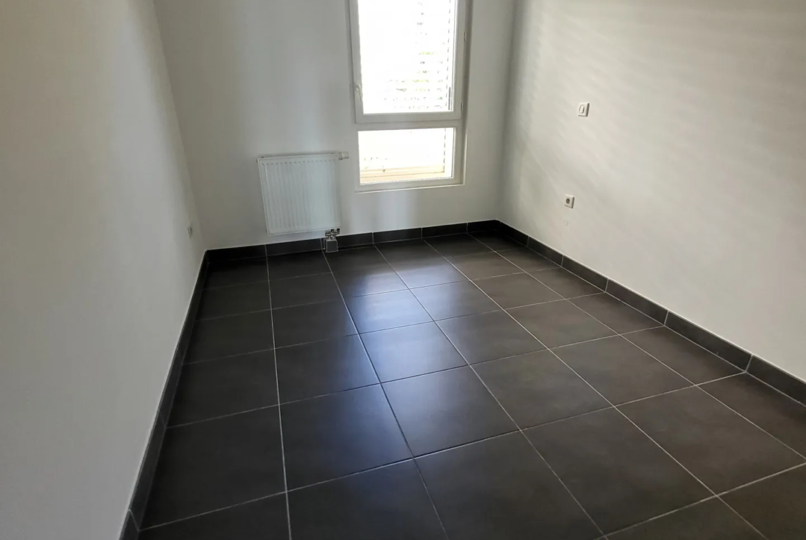 Appartement T3 de 64m2 avec terrasse et parking à Juvignac 