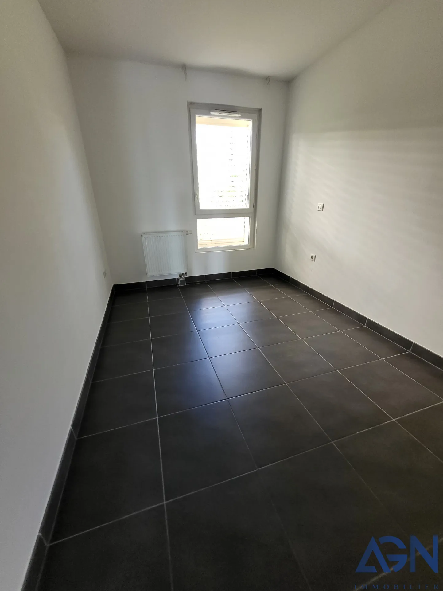 Appartement T3 de 64m2 avec terrasse et parking à Juvignac 