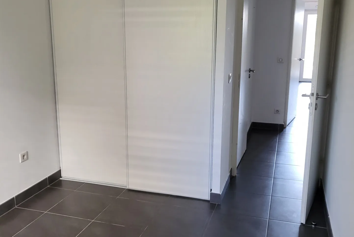 Appartement T3 de 64m2 avec terrasse et parking à Juvignac 