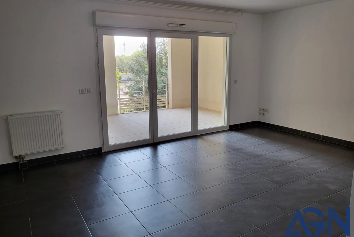 Appartement T3 de 64m2 avec terrasse et parking à Juvignac 