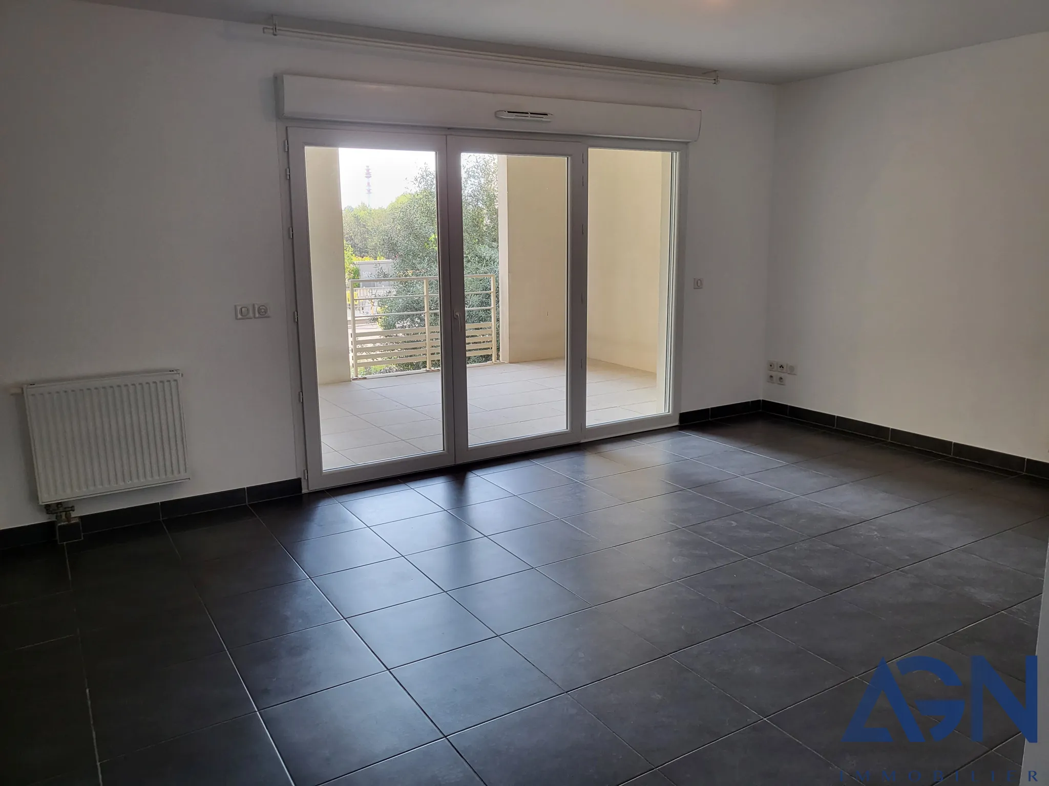 Appartement T3 de 64m2 avec terrasse et parking à Juvignac 