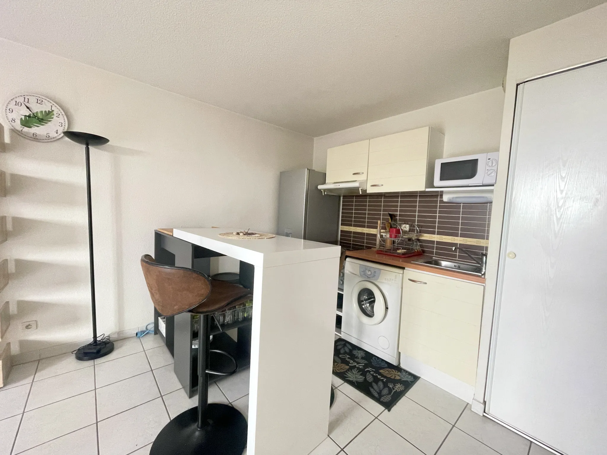 Appartement T2 en rez de jardin + parking 