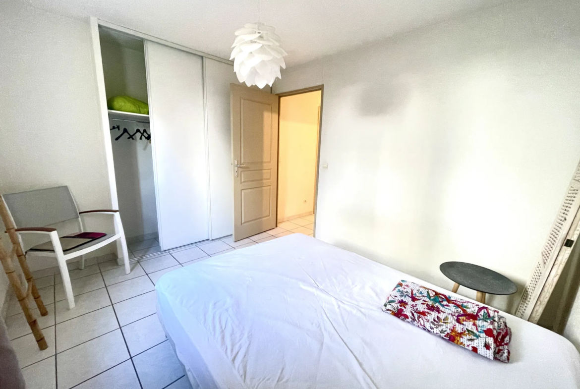 Appartement T2 en rez de jardin + parking 