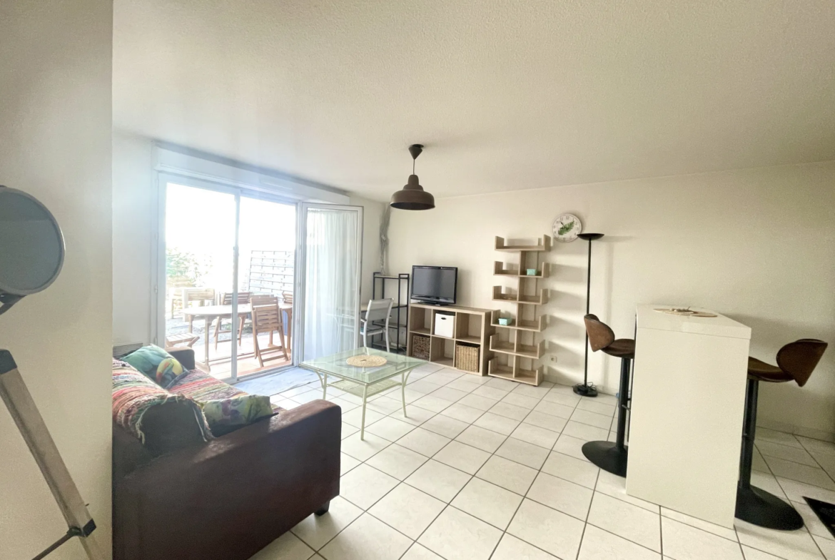 Appartement T2 en rez de jardin + parking 