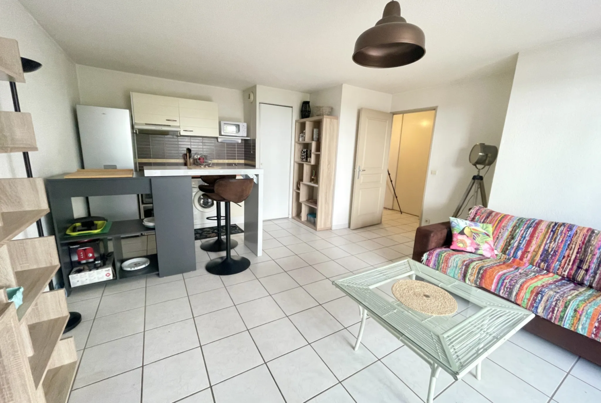 Appartement T2 en rez de jardin + parking 