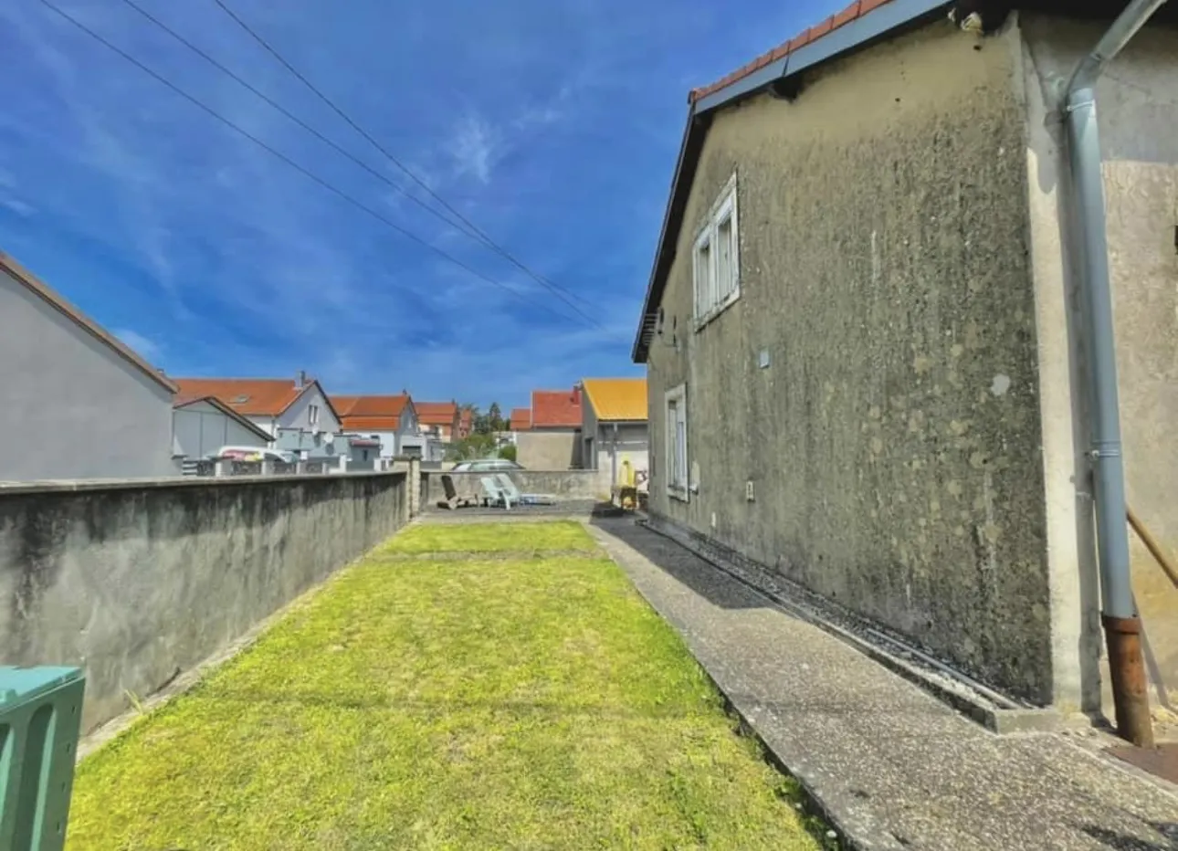 Maison Mitoyenne 100m2 à Sarralbe avec Jardin et Garage 