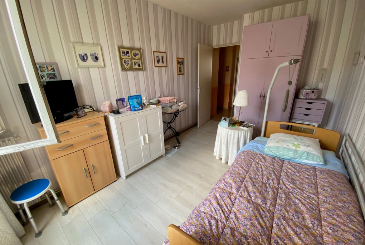 Appartement T3 à Nimes avec balcon ensoleillé et stationnement privé 