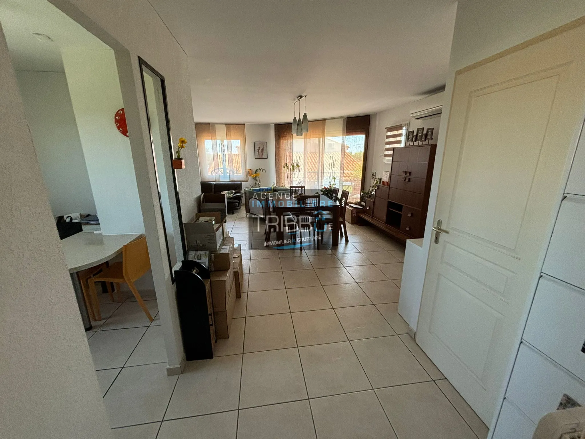 Appartement T4 avec 3 chambres, garage et terrasse à Pollestres 