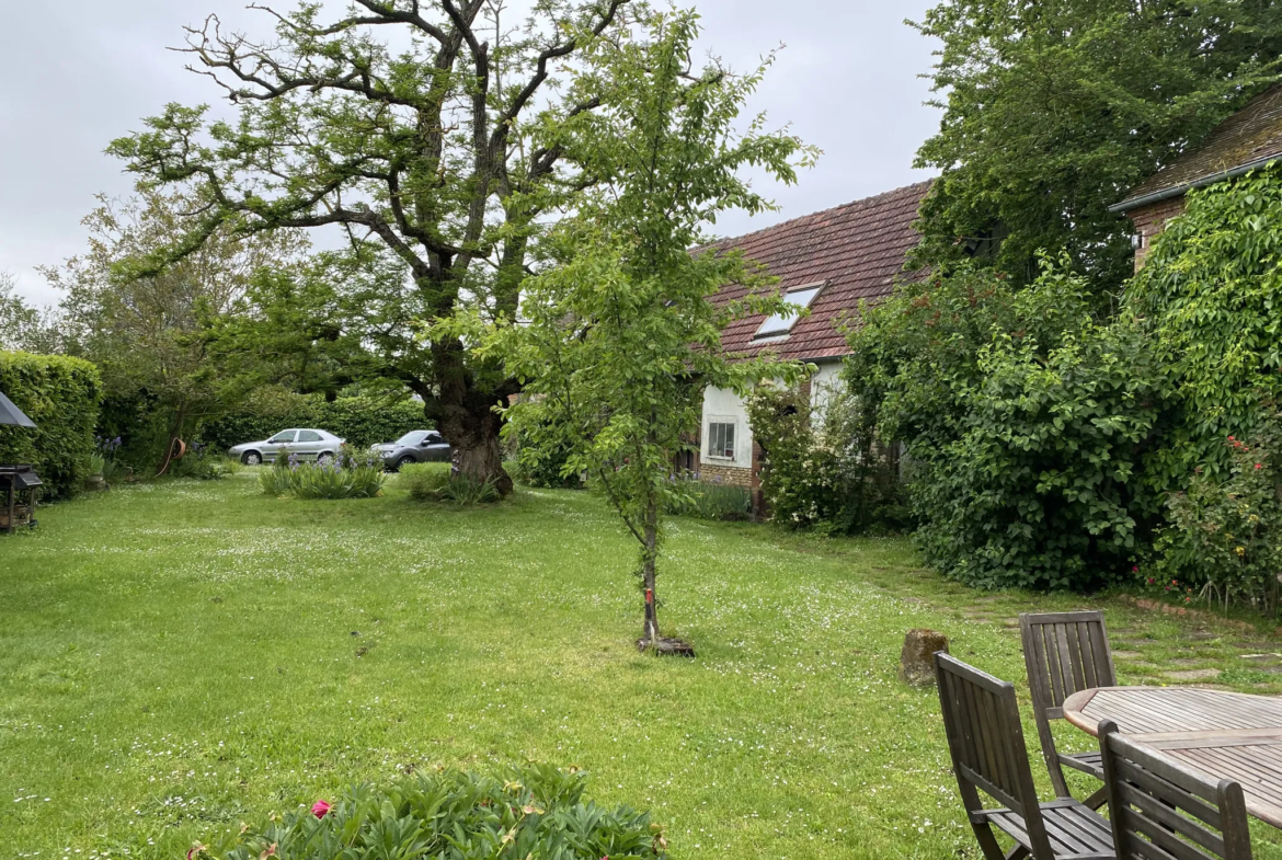 Grange aménagée avec jardin à Pacy-sur-Eure 