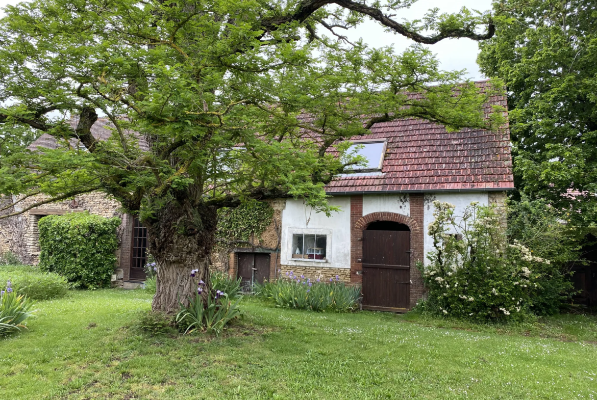 Grange aménagée avec jardin à Pacy-sur-Eure 