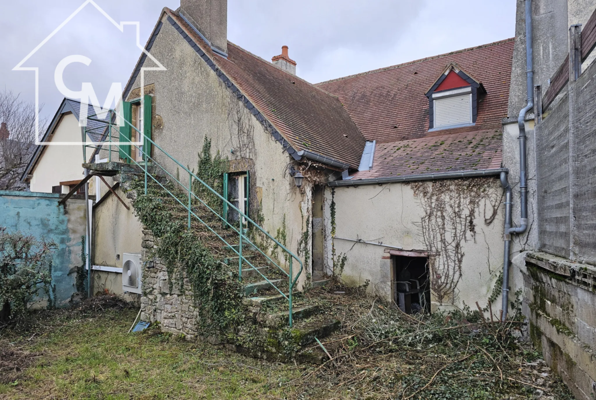 Maison de ville avec jardin à Garigny 