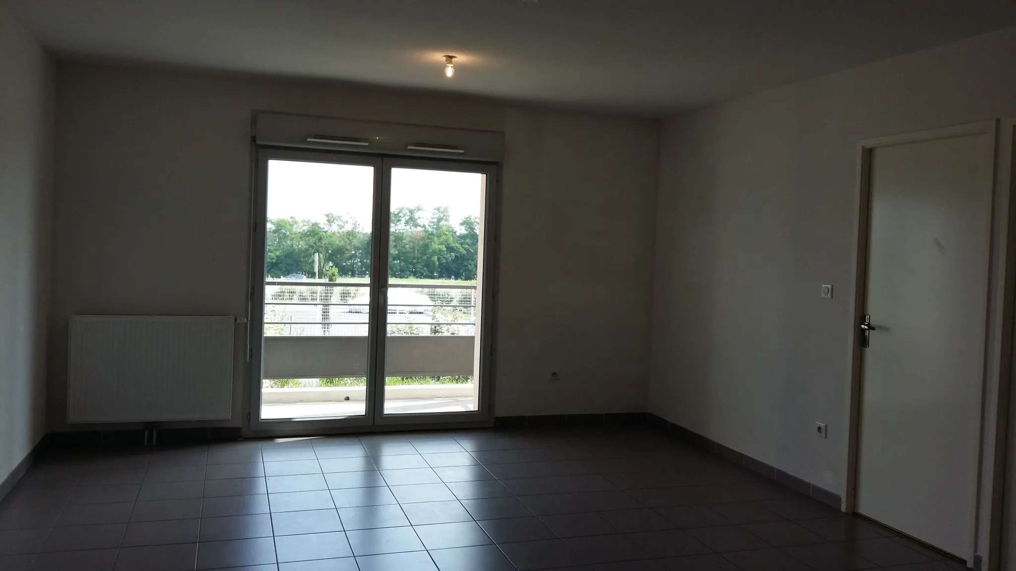 Appartement T3 de 61.5 m2 avec jardin privatif à Cornebarrieu 