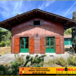 Maison bois de type chalet avec garage à St Michel de Rieufret