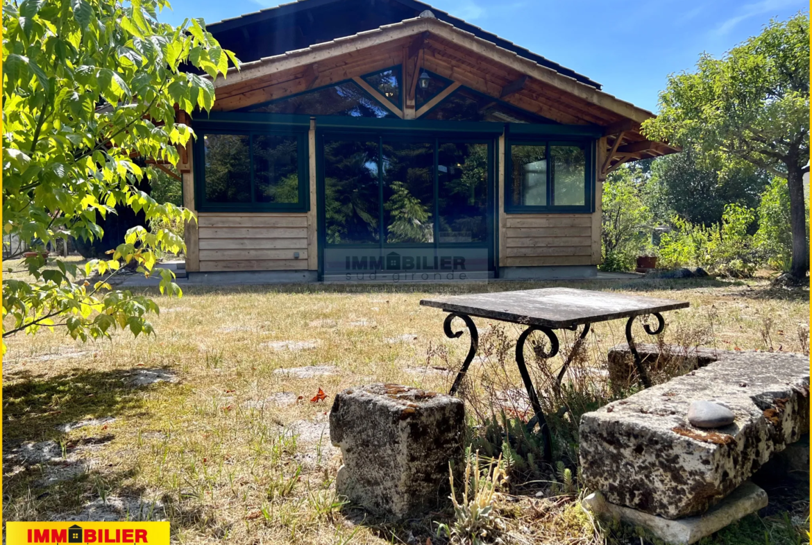 Maison bois de type chalet avec garage à St Michel de Rieufret 