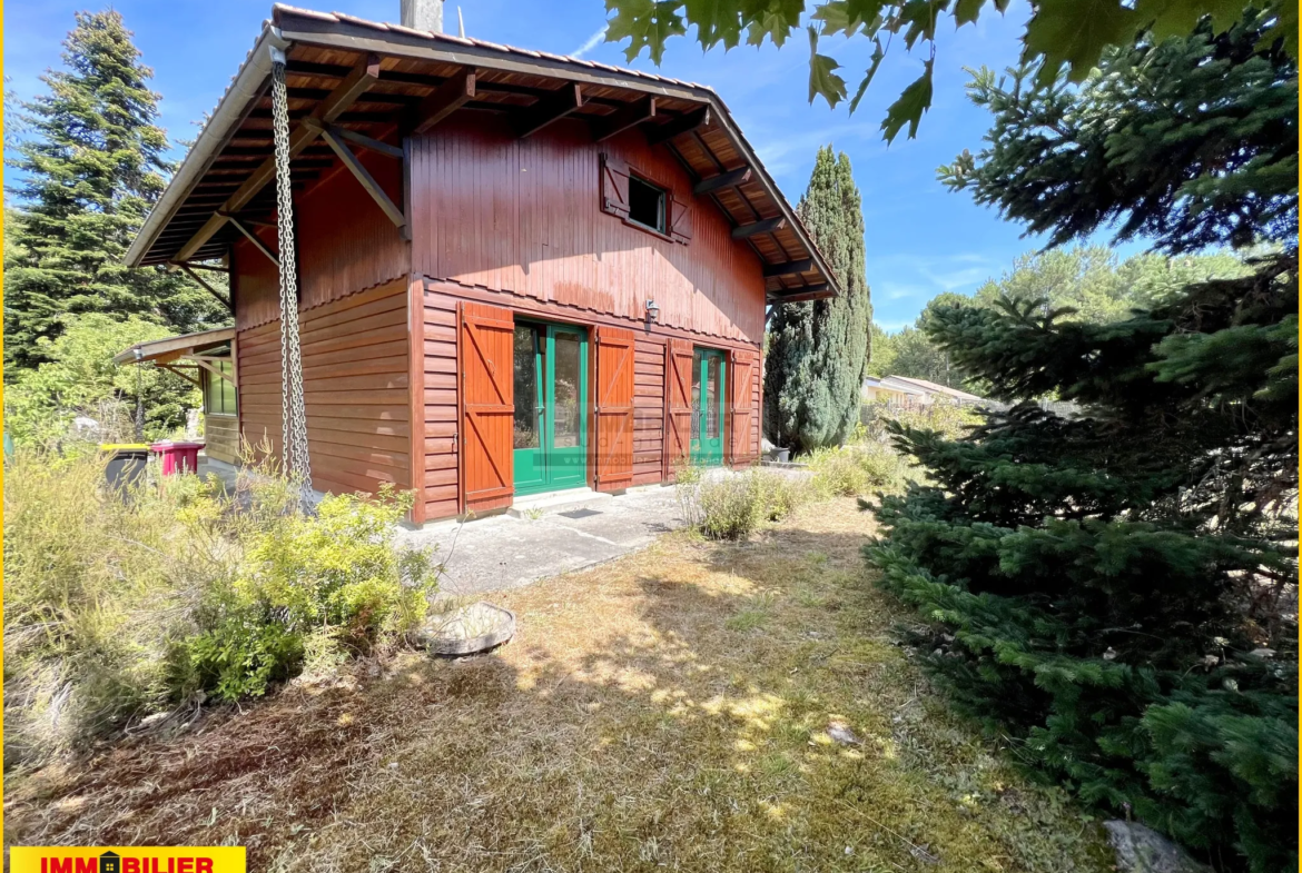 Maison bois de type chalet avec garage à St Michel de Rieufret 