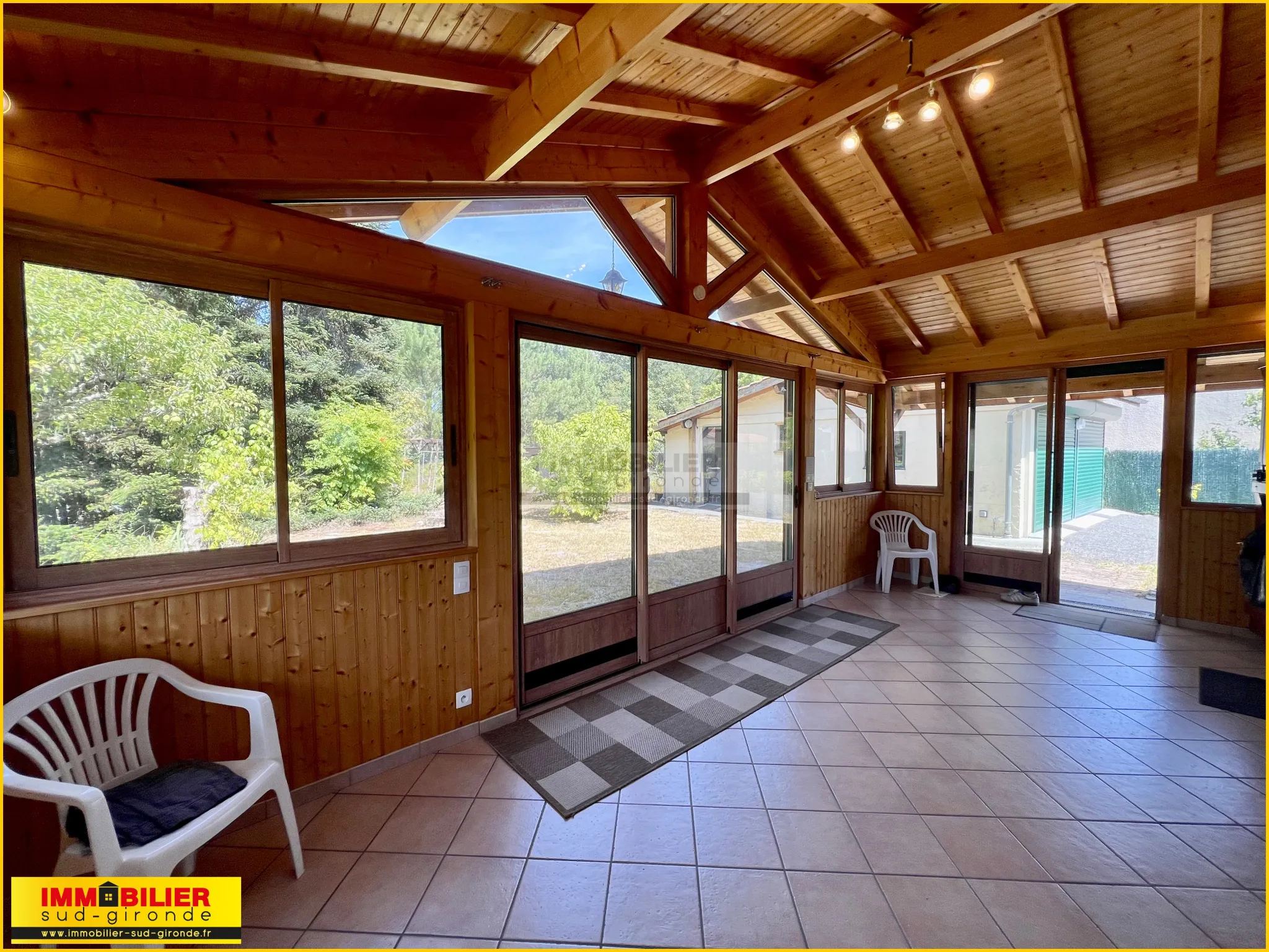 Maison bois de type chalet avec garage à St Michel de Rieufret 