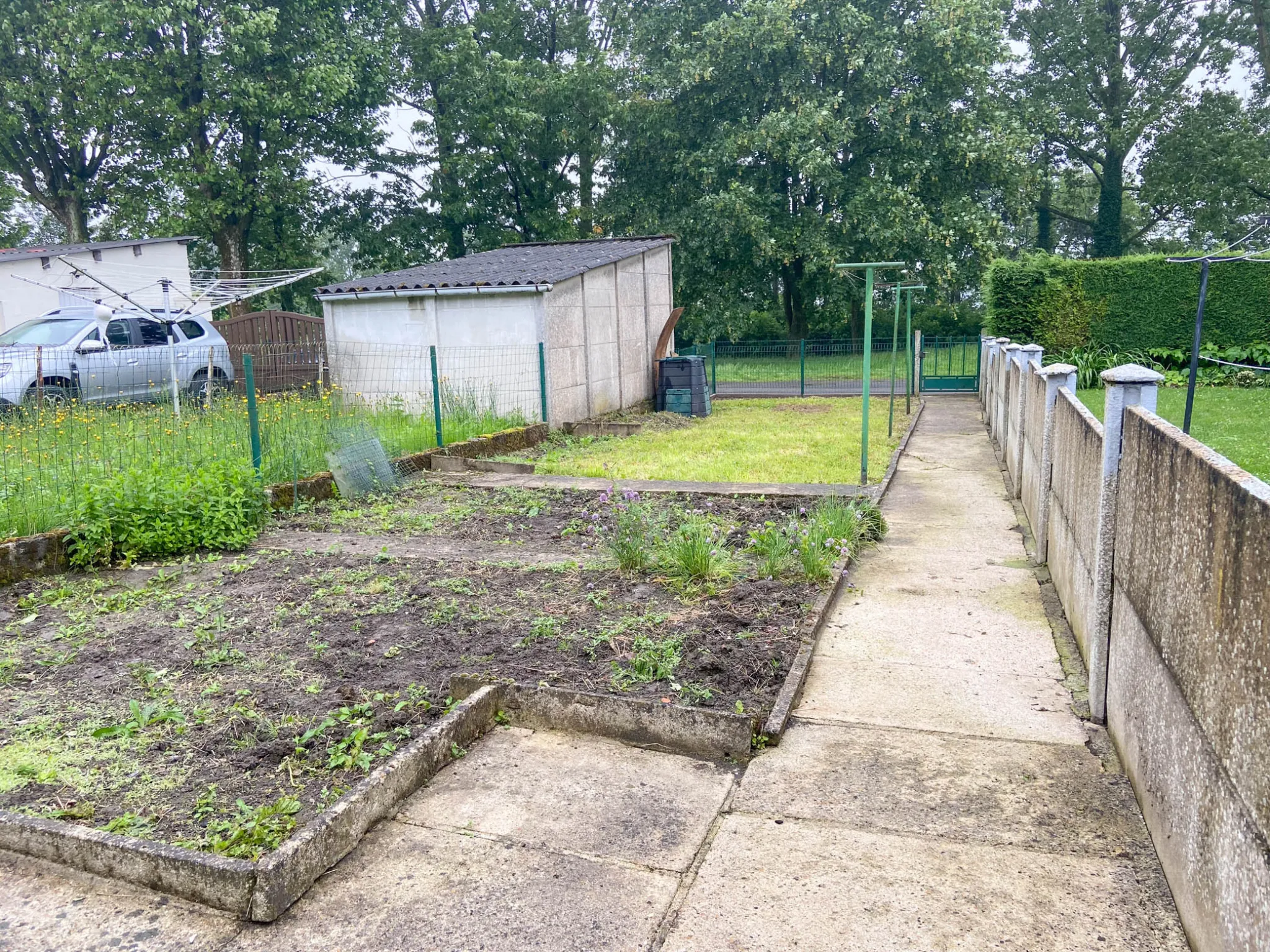 Maison en brique avec jardin et garage potentiel à Boussois 