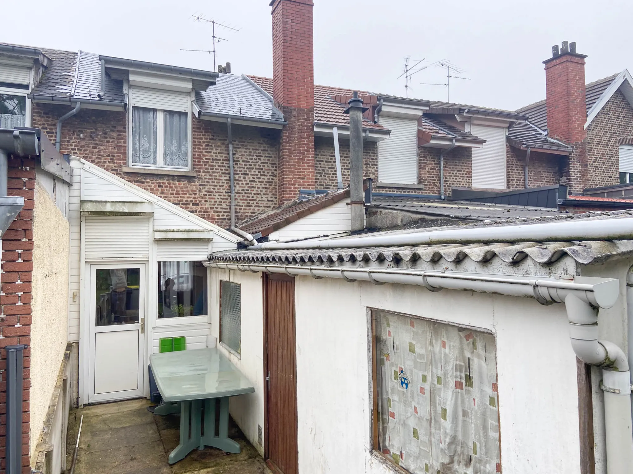 Maison en brique avec jardin et garage potentiel à Boussois 