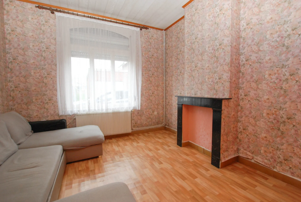 Maison en brique avec jardin et garage potentiel à Boussois 