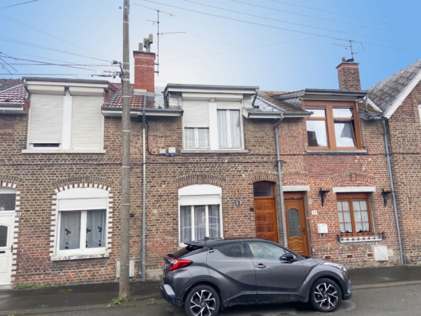 Maison en brique avec jardin et garage potentiel à Boussois