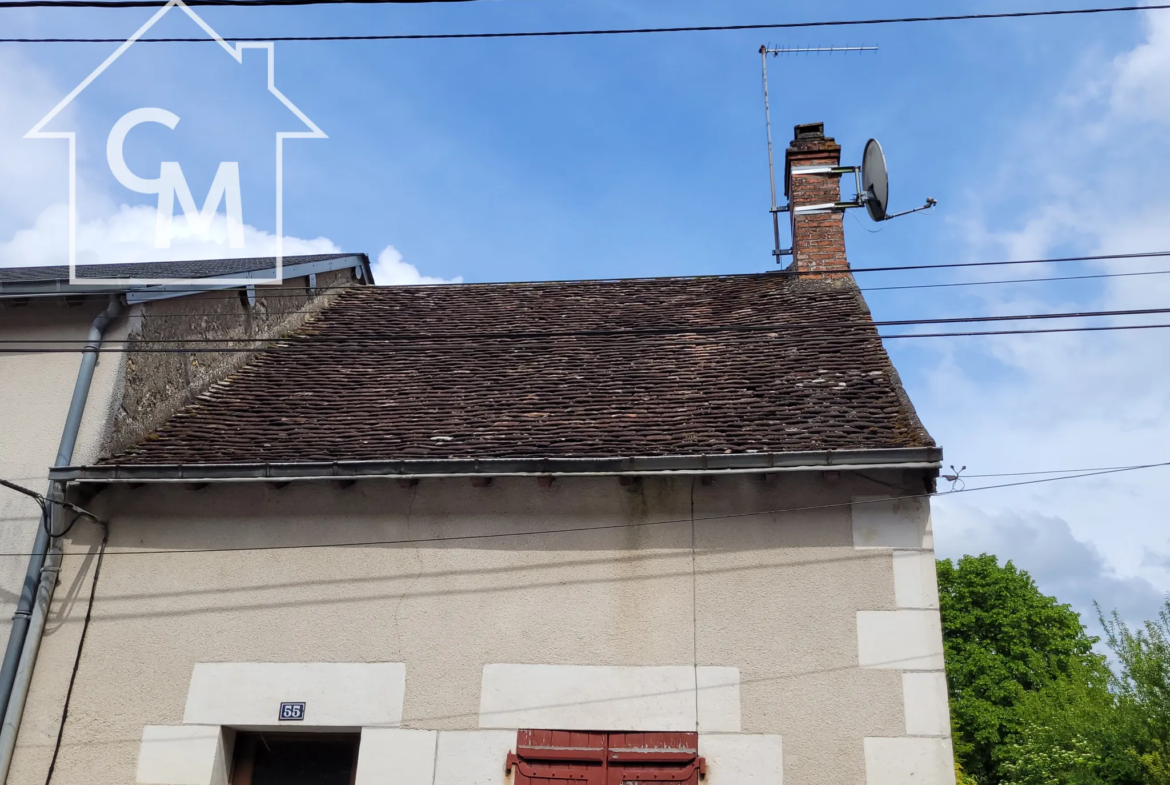 Maison de ville avec jardin et garage à Buzançais 