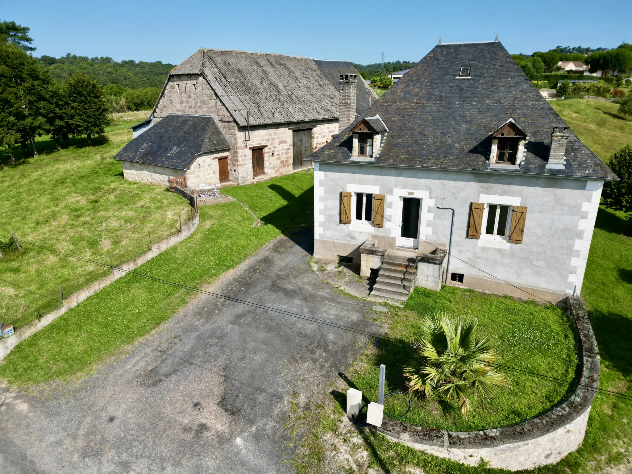 Propriété de caractère avec maison et grange à Malemort sur Corrèze 