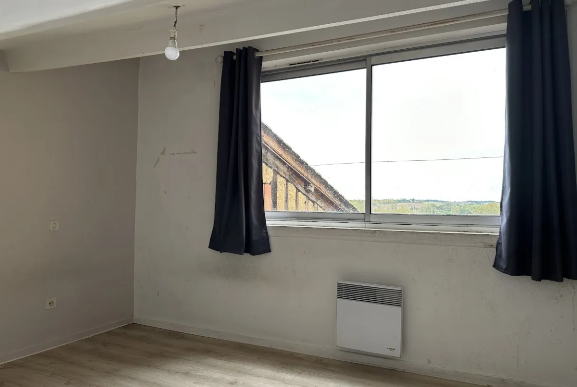 Appartement cosy en vente à Fleurance au cœur du centre-ville 