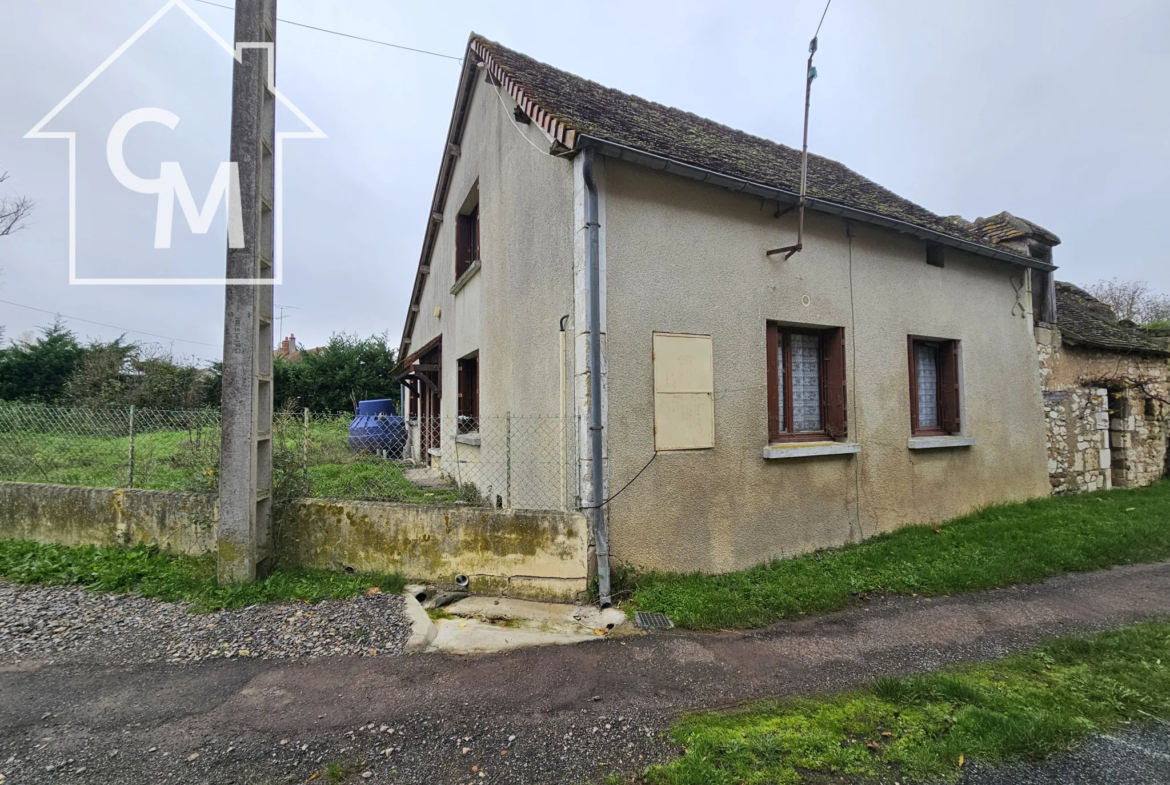 Maison plain pied de 65 m² à vendre avec grange et jardin à Obterre 