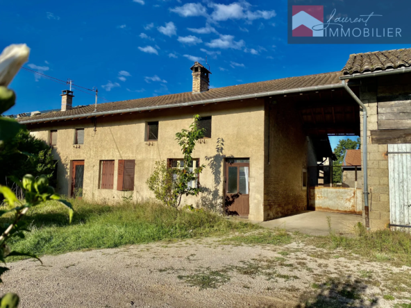 Maison avec dépendances et terrain constructible à Boz