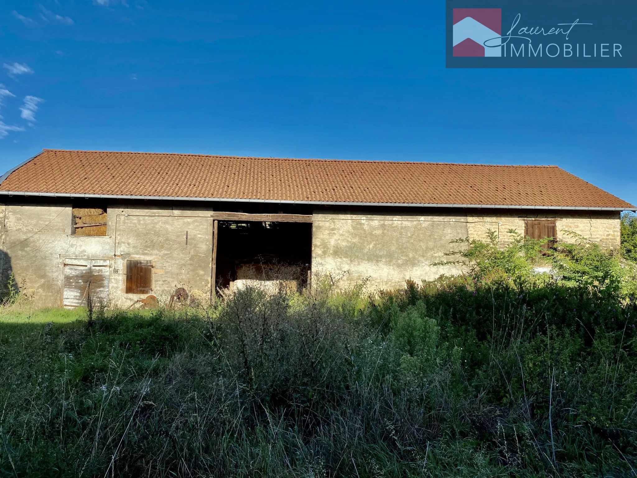 Maison avec dépendances et terrain constructible à Boz 