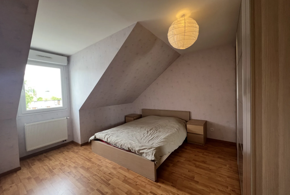 À vendre : Appartement 4 pièces en attique à Colmar avec terrasse 