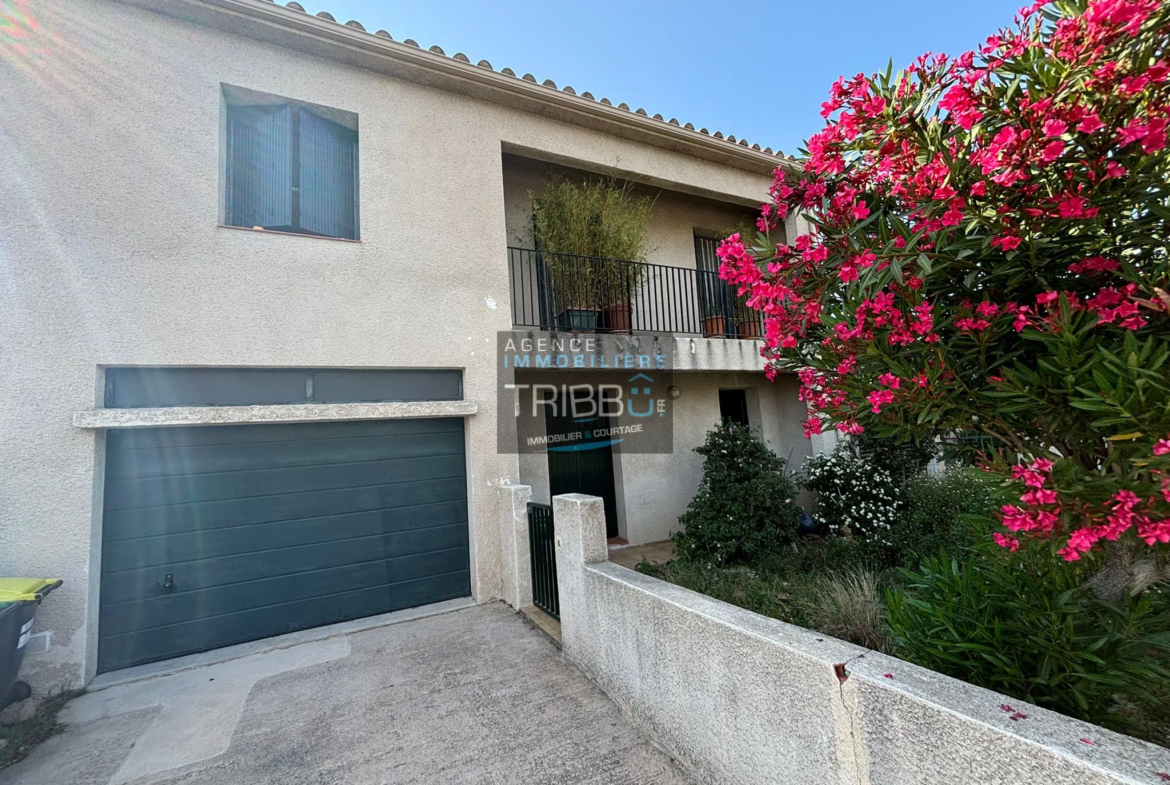 Maison à Perpignan avec 5 chambres, jardin et garage 