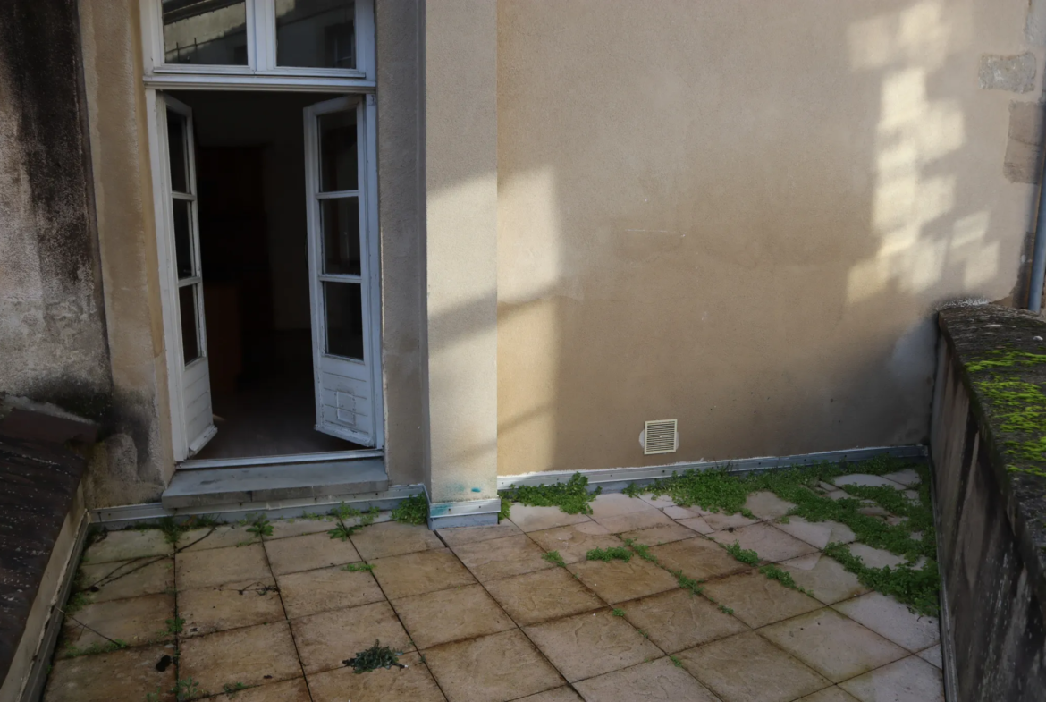 Vente appartement atypique en triplex à Autun 