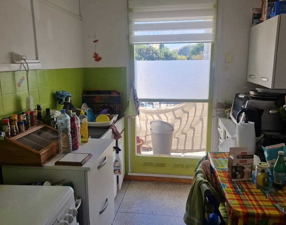 Appartement de type 3 avec balcon et cave à Marignane 