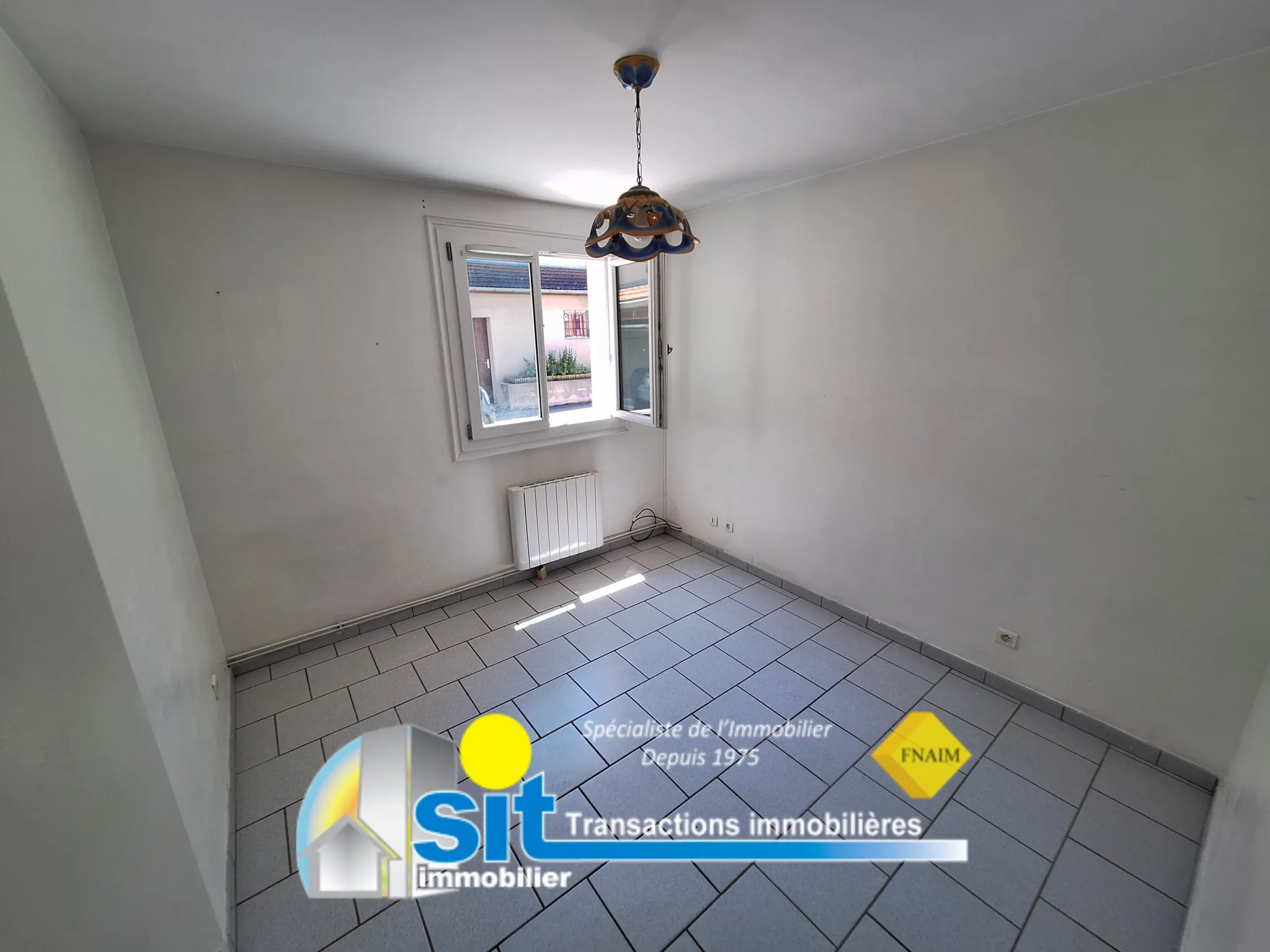 Appartement T3 à vendre à Auberives-sur-Vareze - 58 m² avec garage 