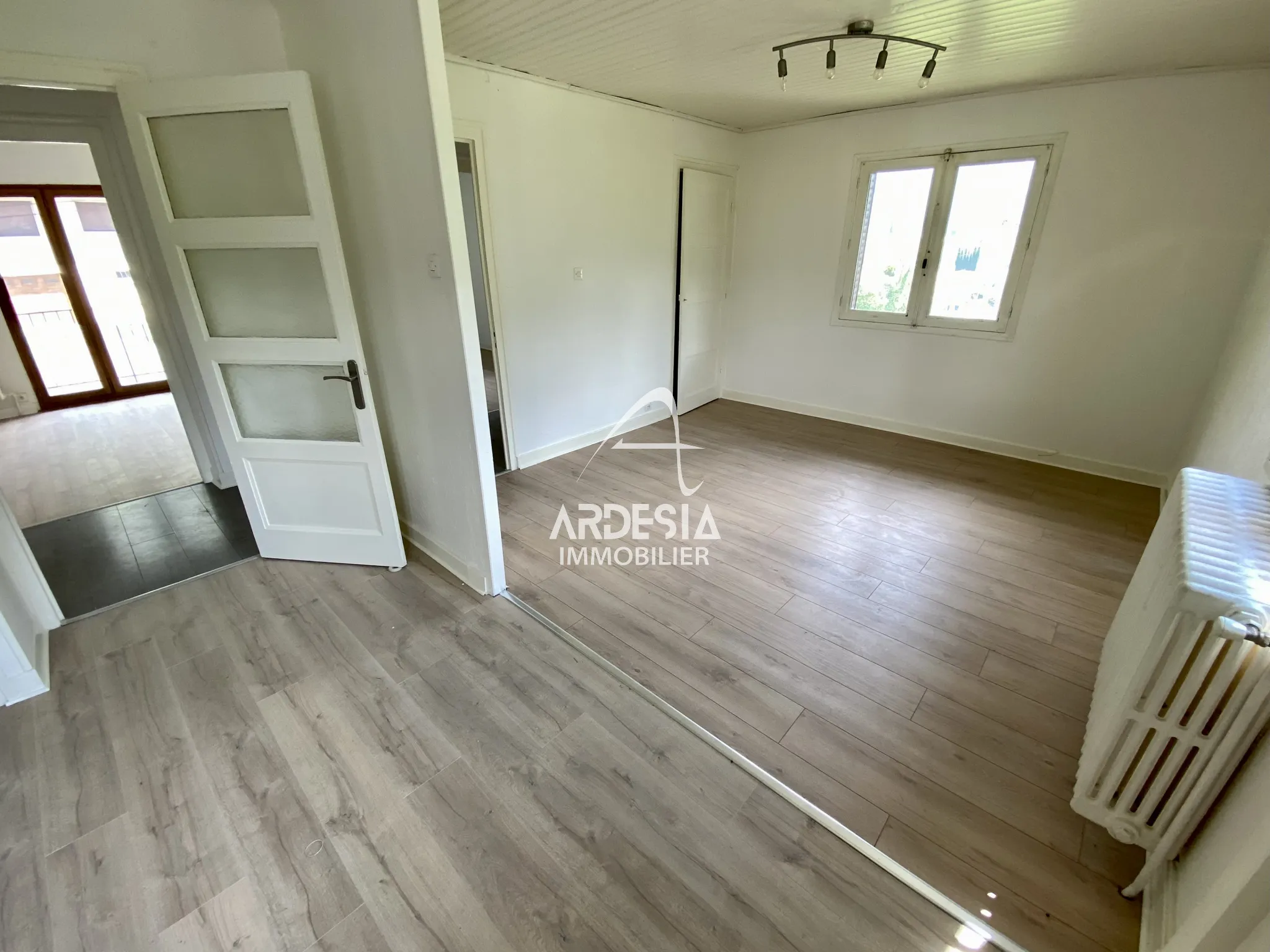 À vendre : Appartement T3 avec garage et jardin à Saint-Julien-Mont-Denis 