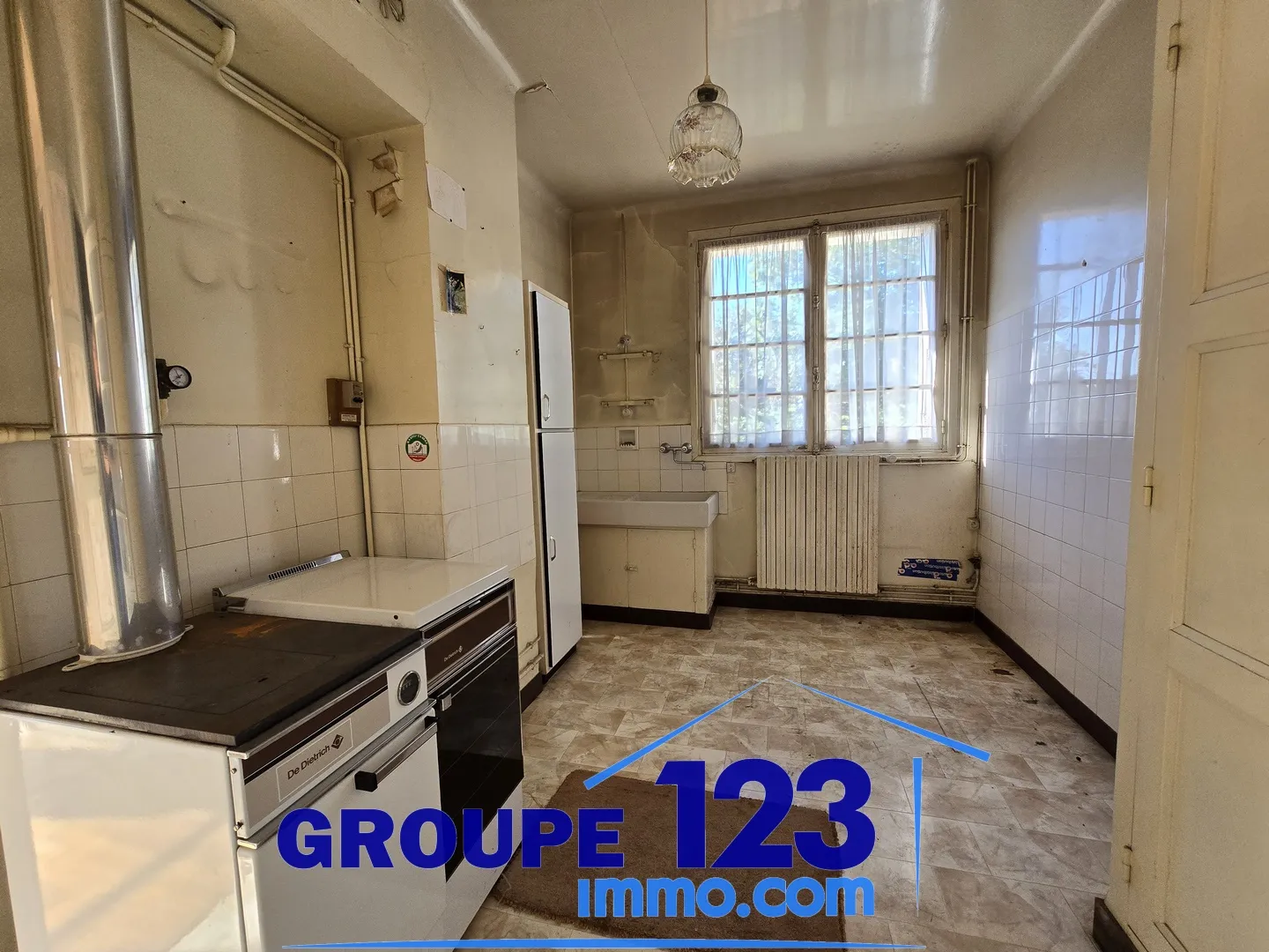 Maison T4 avec cour et garage à vendre à Auxerre 