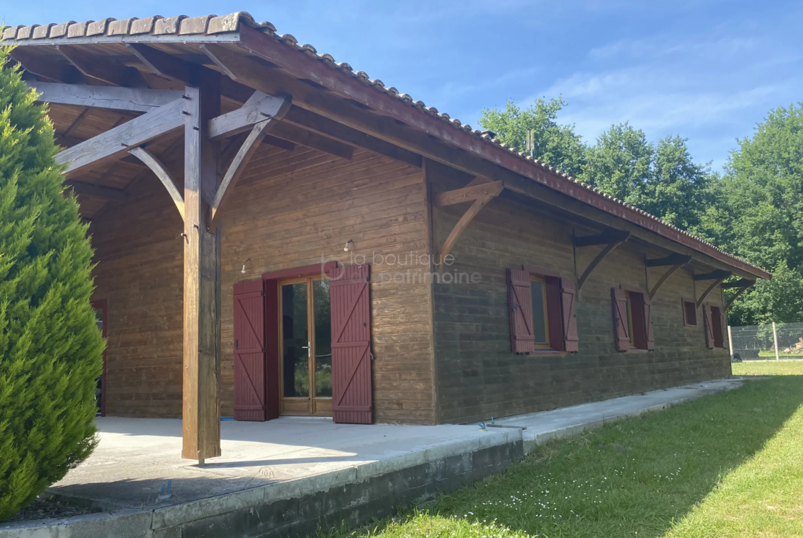 Maison en bois de 4 chambres à St Symphorien, proche du lac 