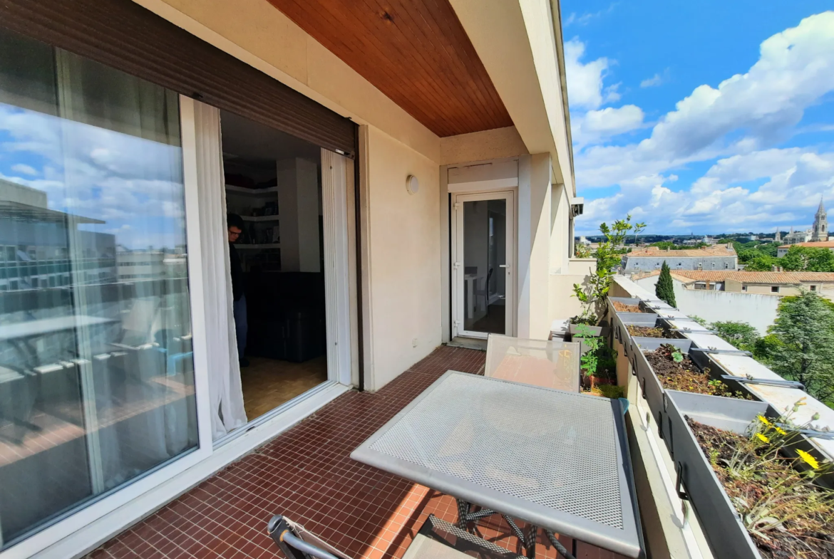 À vendre : Appartement P3 rénové à Nîmes Centre avec terrasse et garage 