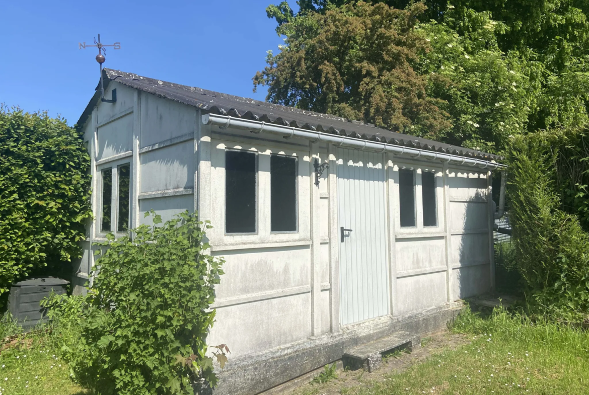 Maison de plain-pied à vendre à Rousies avec jardin et garage 